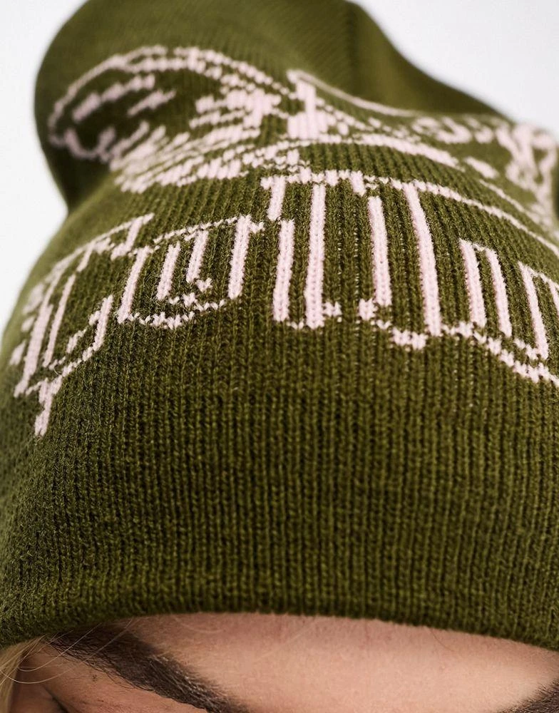商品COLLUSION|COLLUSION skater beanie with cupid graphic knit in dark khaki,价格¥39,第3张图片详细描述