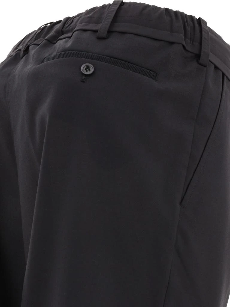 商品Sacai|Sacai Drawstring Mid-Rise Tapered Trousers,价格¥2587,第4张图片详细描述