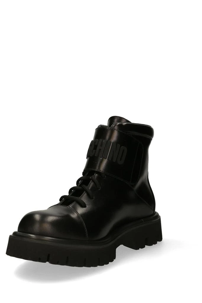 商品Moschino|Moschino Logo Embossed Buckled Boots,价格¥4137,第3张图片详细描述