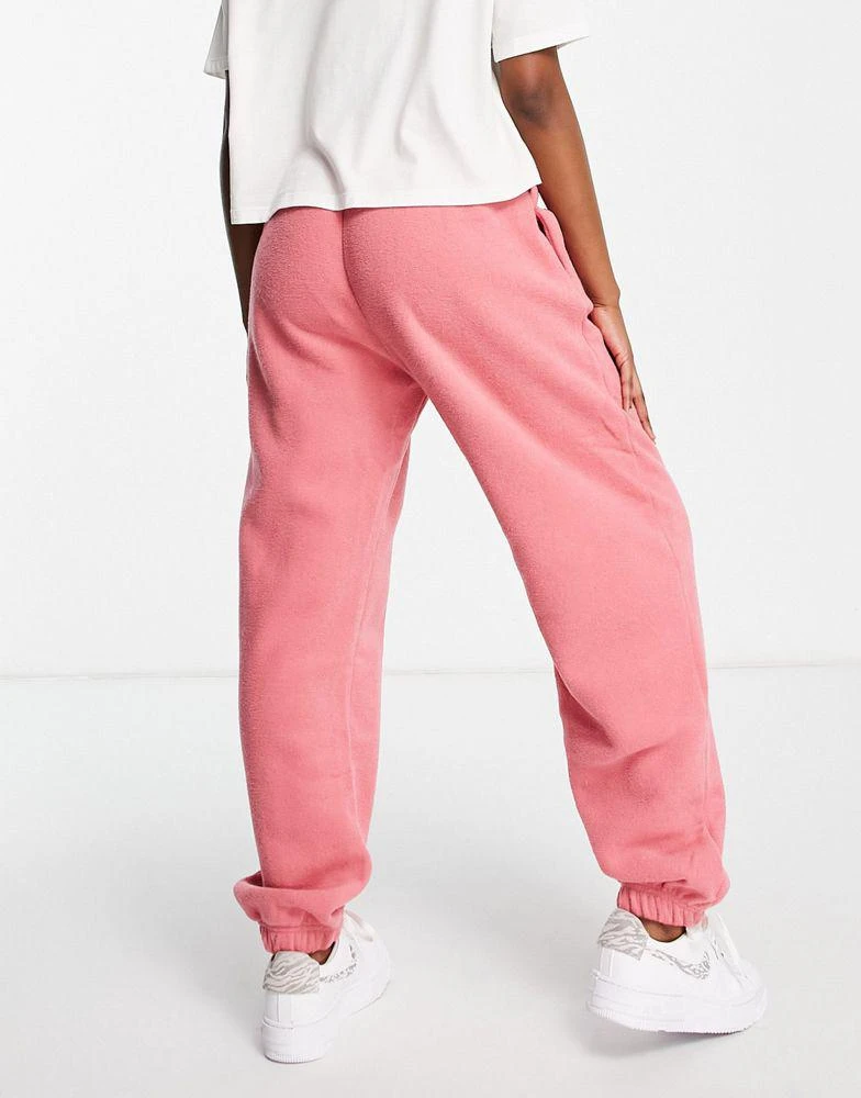 商品NIKE|Nike mini swoosh high rise plush joggers in archaeo pink,价格¥257,第2张图片详细描述