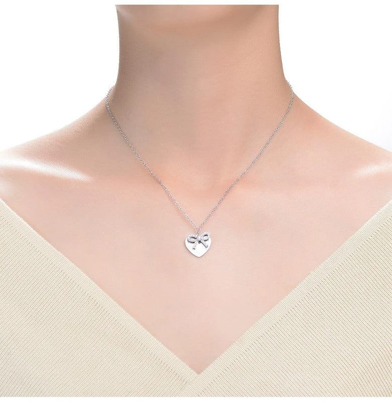 商品Rachel Glauber|White Gold Plated Bow Tie on Heart Shaped Pendant Necklace,价格¥415,第3张图片详细描述