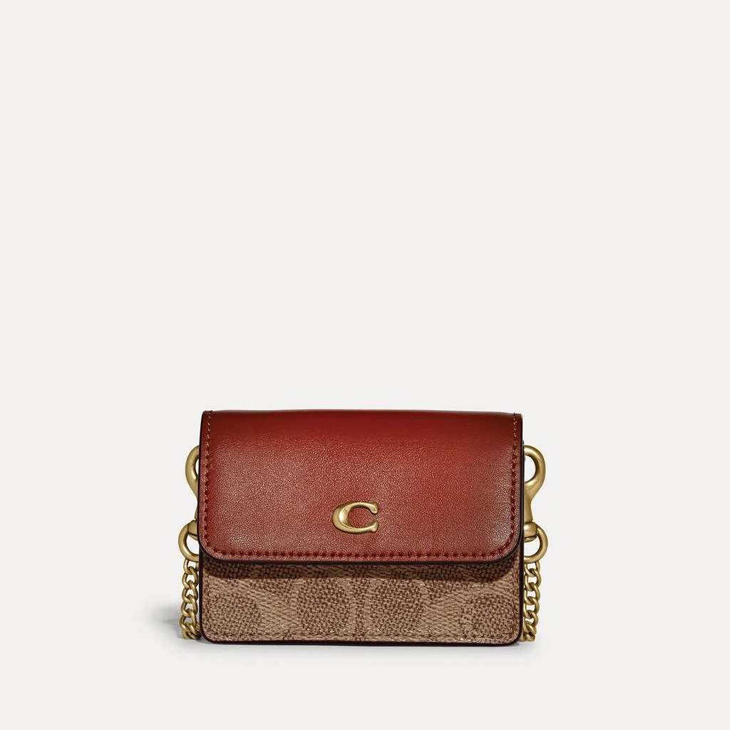 商品Coach|Coach Coated Canvas Signature Half Flap Card Case,价格¥676,第1张图片