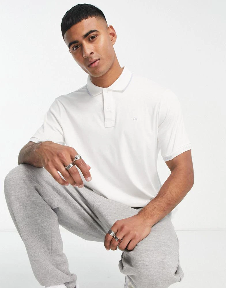 商品Calvin Klein|Calvin Klein logo jacquard polo shirt in white,价格¥464,第1张图片