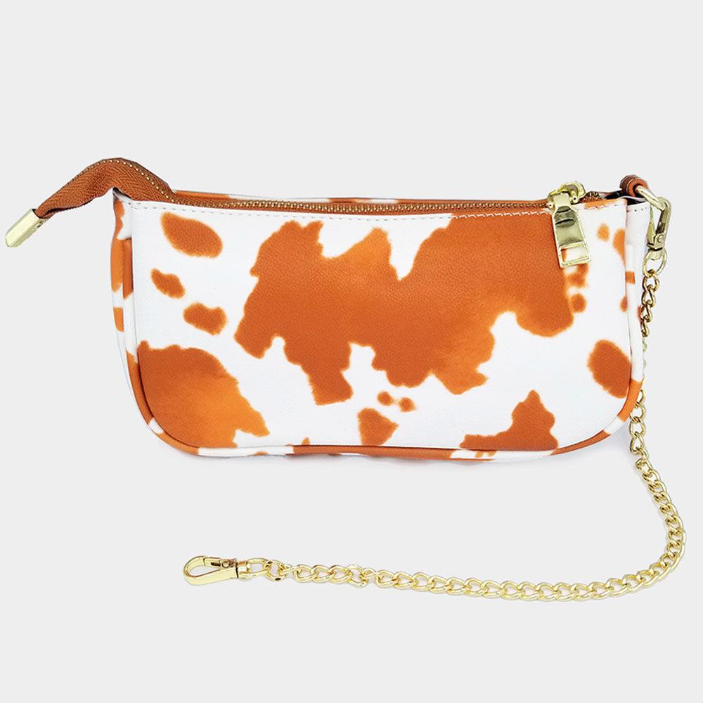 Bolsa a tiracolo em pele sintética com estampa de vaca image 2