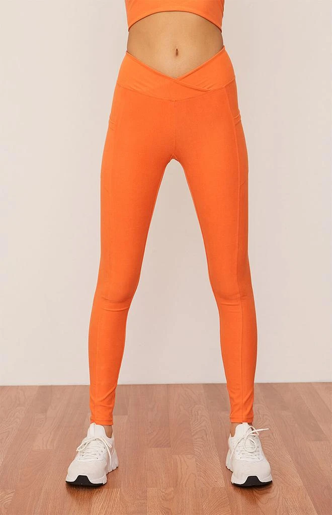 商品Wolven|Eco Tangerine Ruched Crossover Leggings,价格¥725,第1张图片