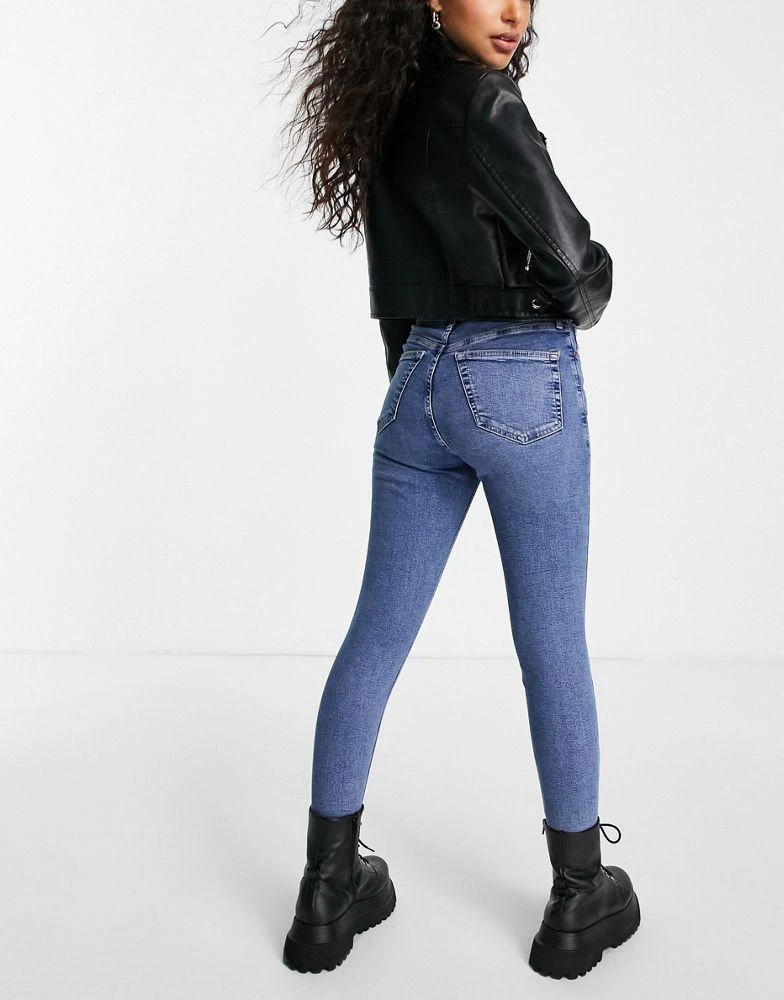 商品Topshop Petite|Topshop Petite Jamie jeans in mid blue,价格¥177,第3张图片详细描述