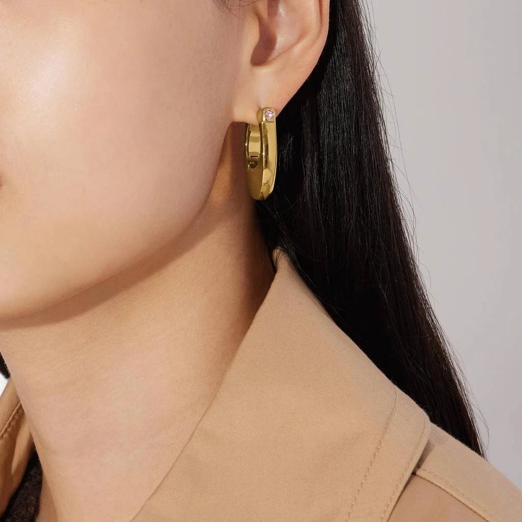 商品The Hut|Coach Chunky C Gold-Tone and Crystal Hoop Earrings,价格¥561,第2张图片详细描述