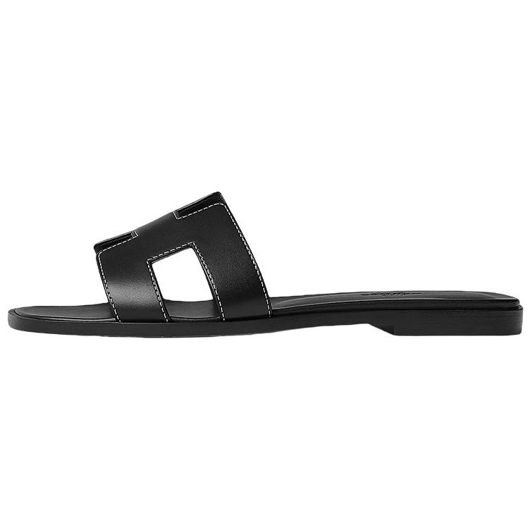 商品[国内直发] Hermes|爱马仕 Oran 头层牛皮 小牛皮 经典“H”鞋面 一字拖鞋 女款 黑色,价格¥5886,第1张图片