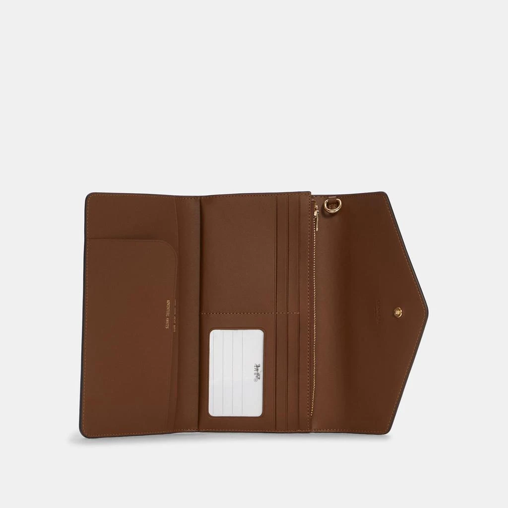 商品Coach|Coach Outlet Travel Envelope Wallet In Blocked Signature Canvas,价格¥995,第1张图片