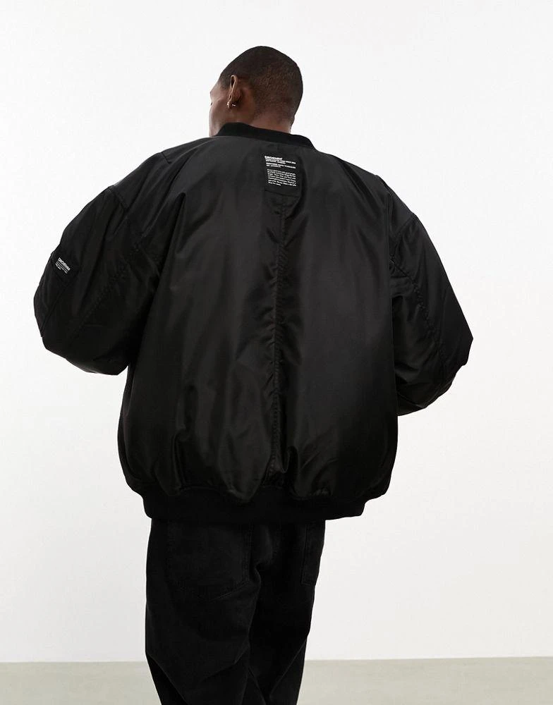 Dr Denim Hector oversized bomber jacket with pocket on sleeve in black