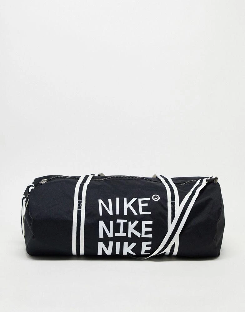 商品NIKE|Nike Heritage duffel bag in black with white 'NIKE' logo,价格¥290,第1张图片