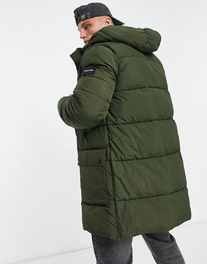 商品Calvin Klein|Calvin Klein crinkle nylon longline hooded puffer jacket in dark green,价格¥3238,第4张图片详细描述