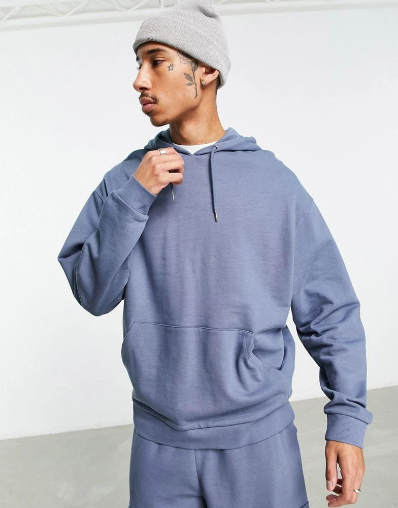 商品ASOS|ASOS DESIGN oversized hoodie and oversized joggers with cargo pocket tracksuit in blue,价格¥256,第3张图片详细描述