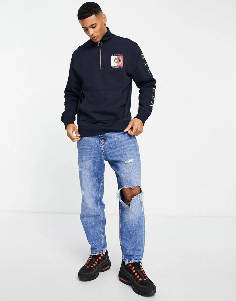 商品Tommy Hilfiger|Tommy Hilfiger embroid icon square logo half zip sweatshirt in navy,价格¥782,第2张图片详细描述