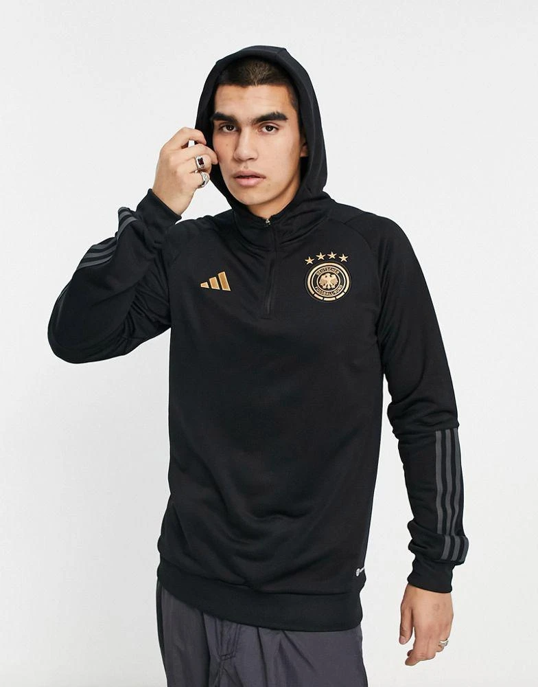 商品Adidas|adidas Football Germany World Cup 2022 off-pitch 3 stripe 1/4 zip hoodie in black,价格¥536,第1张图片