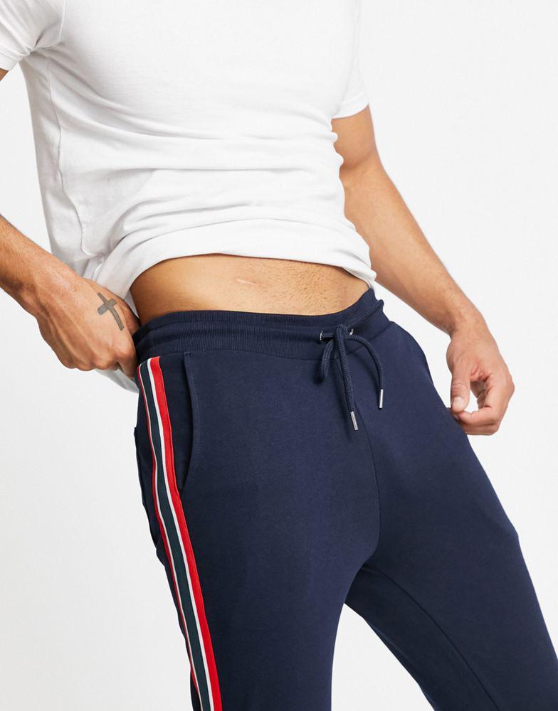 ASOS DESIGN skinny joggers with side stripe in navy商品第3张图片规格展示