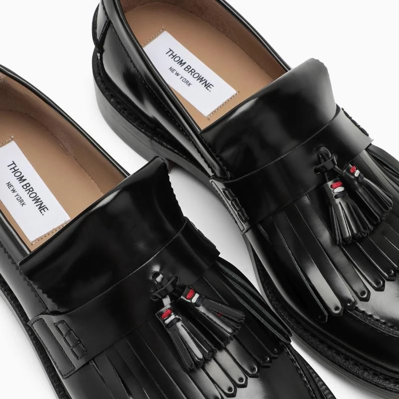 Black leather moccasin with tassels 商品