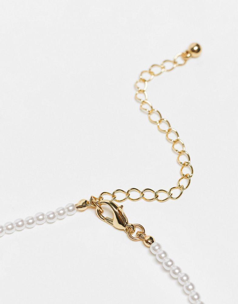 商品Reclaimed Vintage|Reclaimed Vintage skinny pearl bow necklace,价格¥83,第6张图片详细描述