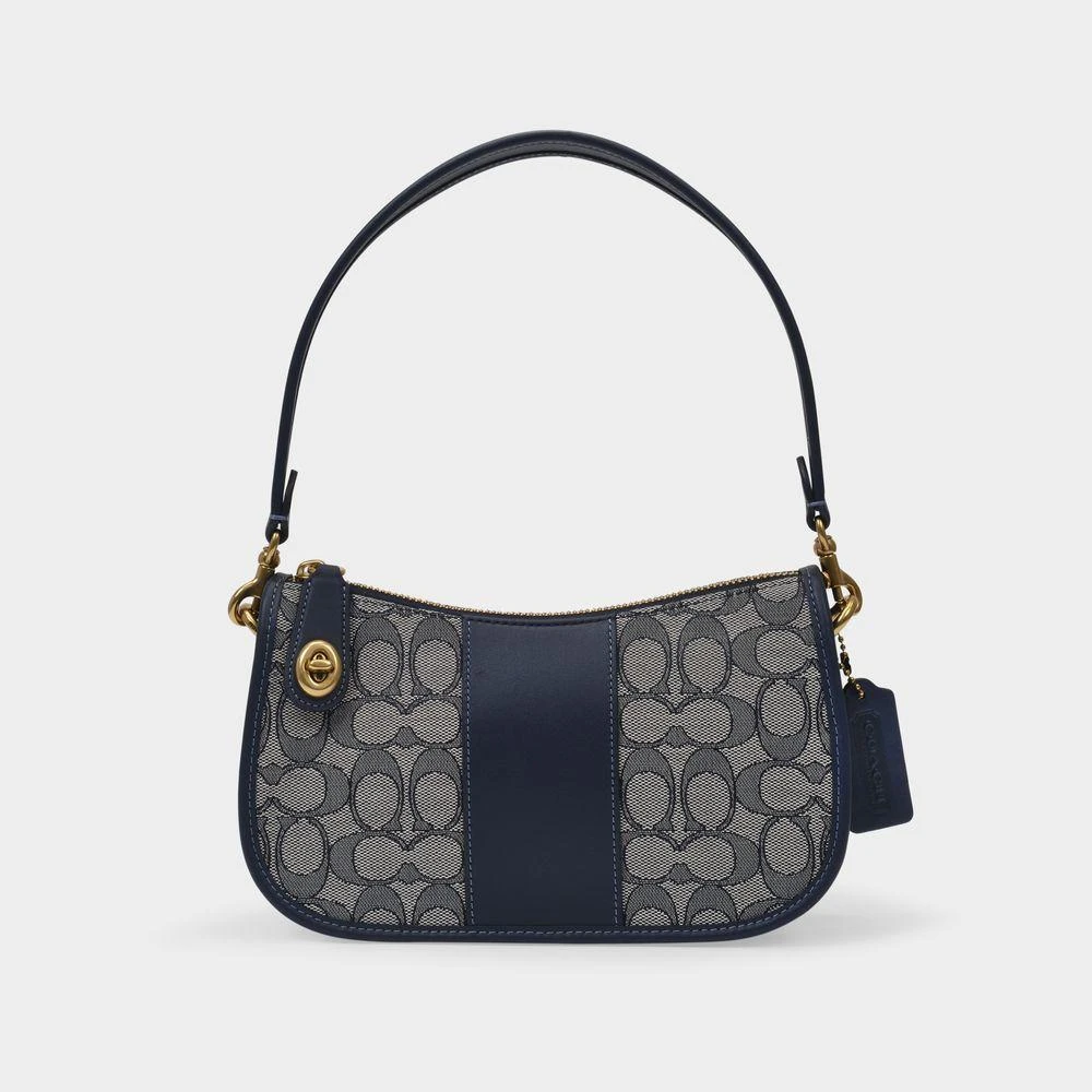 商品Coach|Signature Jacquard Swinger in Navy,价格¥4177,第1张图片