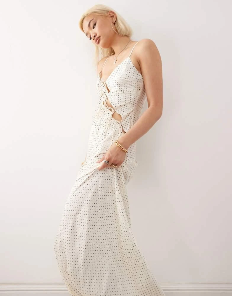 商品Lioness|Lioness About A Girl asymmetric bow tie cutout detail satin maxi dress in white polka dot,价格¥206,第2张图片详细描述