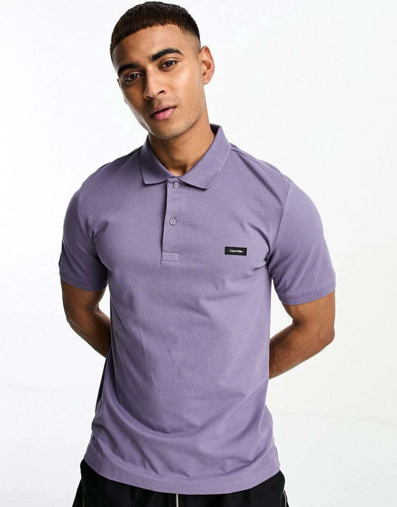 商品Calvin Klein|Calvin Klein stretch slim fit button up polo in purple,价格¥735,第1张图片