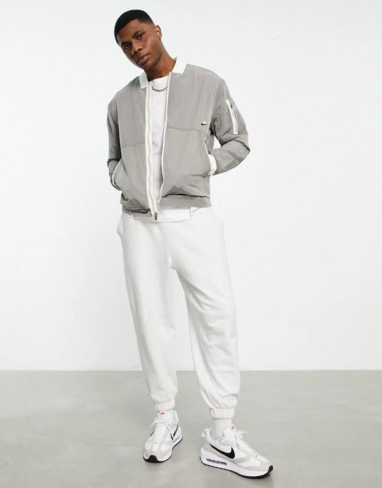 商品NIKE|Nike Premium Essentials lined bomber jacket in stone,价格¥511,第3张图片详细描述