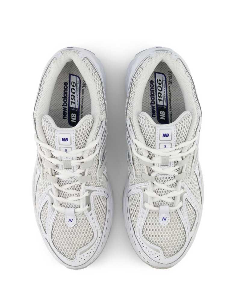 Shop New Balance 1906 unisex sneakers in white on Sale at