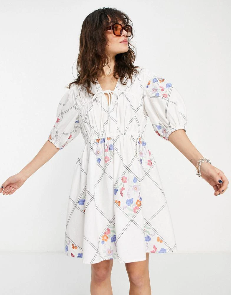 商品ASOS|ASOS DESIGN tie front mini smock dress in patchwork floral embroidery in white,价格¥183,第4张图片详细描述