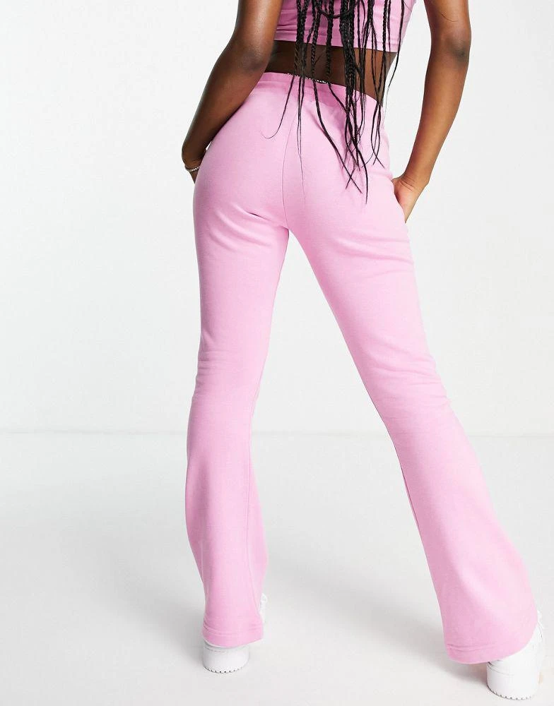 商品Adidas|adidas Originals '2000s Luxe'  track pant in pink with diamante logo,价格¥525,第2张图片详细描述