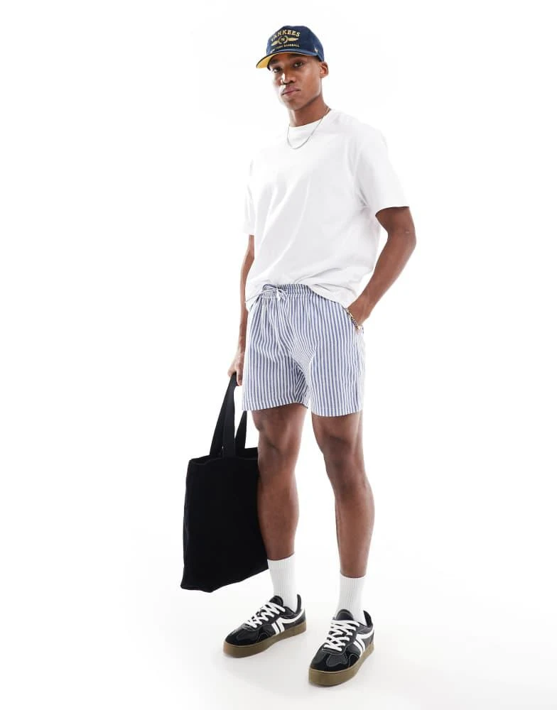商品Another Influence|Another Influence striped relaxed fit shorts in blue and white,价格¥227,第1张图片