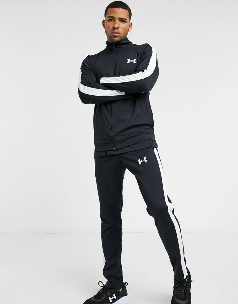 商品Under Armour|Under Armour tracksuit set in black with white stripe,价格¥307,第1张图片