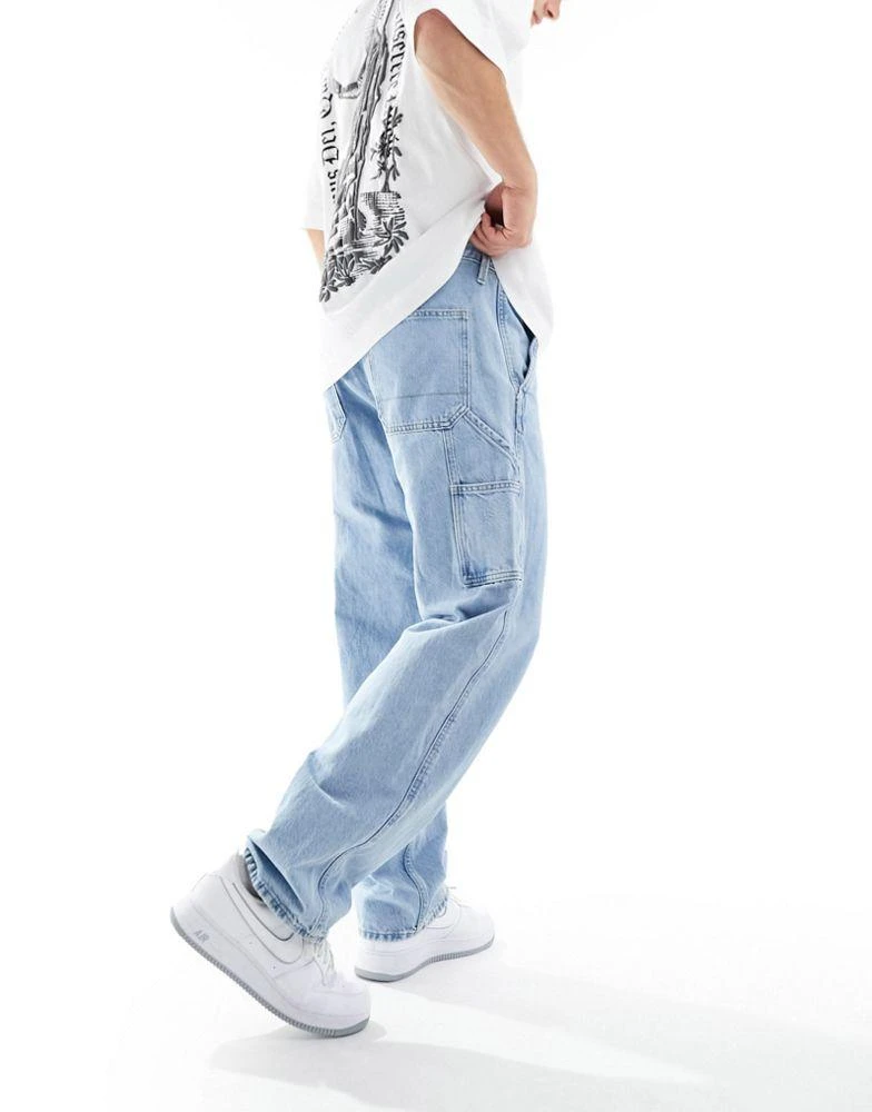 商品Jack & Jones|Jack & Jones loose fit carpenter jeans in light blue wash,价格¥443,第2张图片详细描述