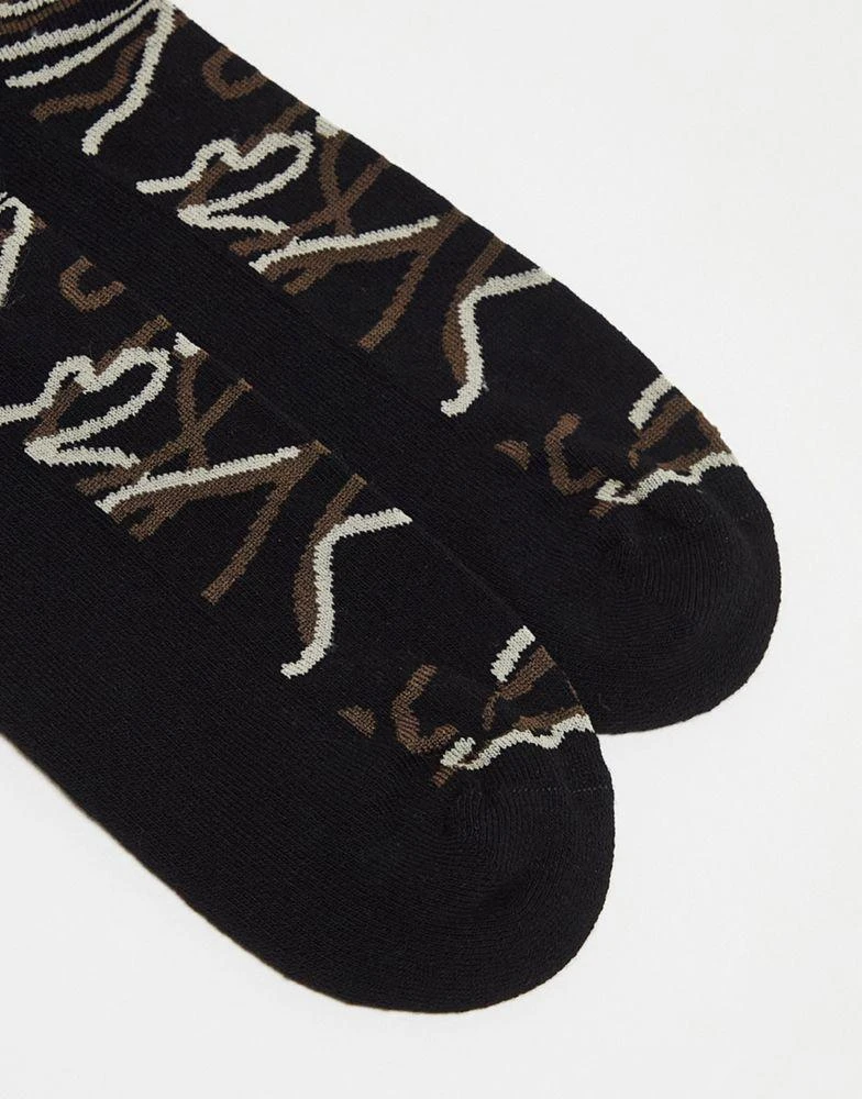 商品ASOS|ASOS DESIGN sports socks in black with camo line design,价格¥50,第2张图片详细描述