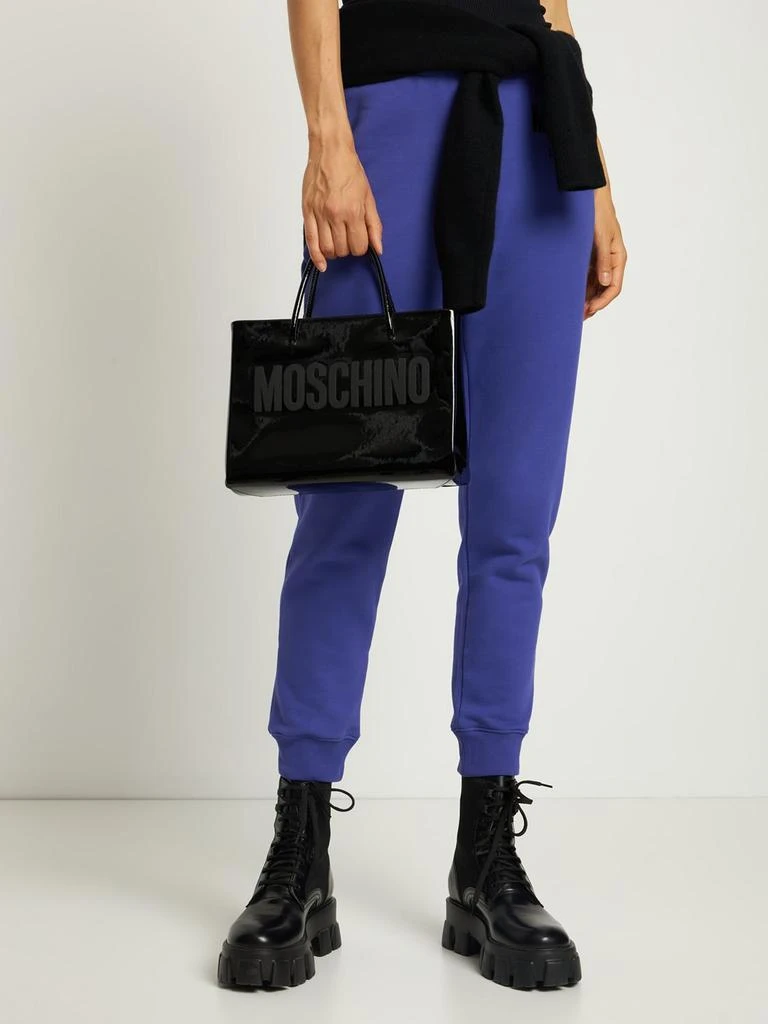 商品Moschino|Logo Patent Leather Tote Bag,价格¥5882,第1张图片详细描述