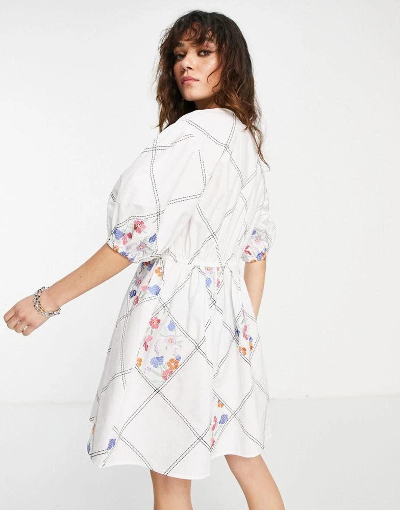 商品ASOS|ASOS DESIGN tie front mini smock dress in patchwork floral embroidery in white,价格¥183,第2张图片详细描述