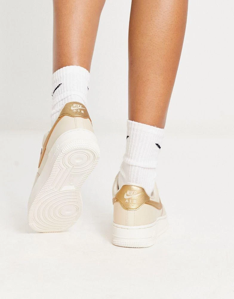 商品NIKE|Nike AF1 '07 trainers in pink and gold metallic,价格¥756,第2张图片详细描述
