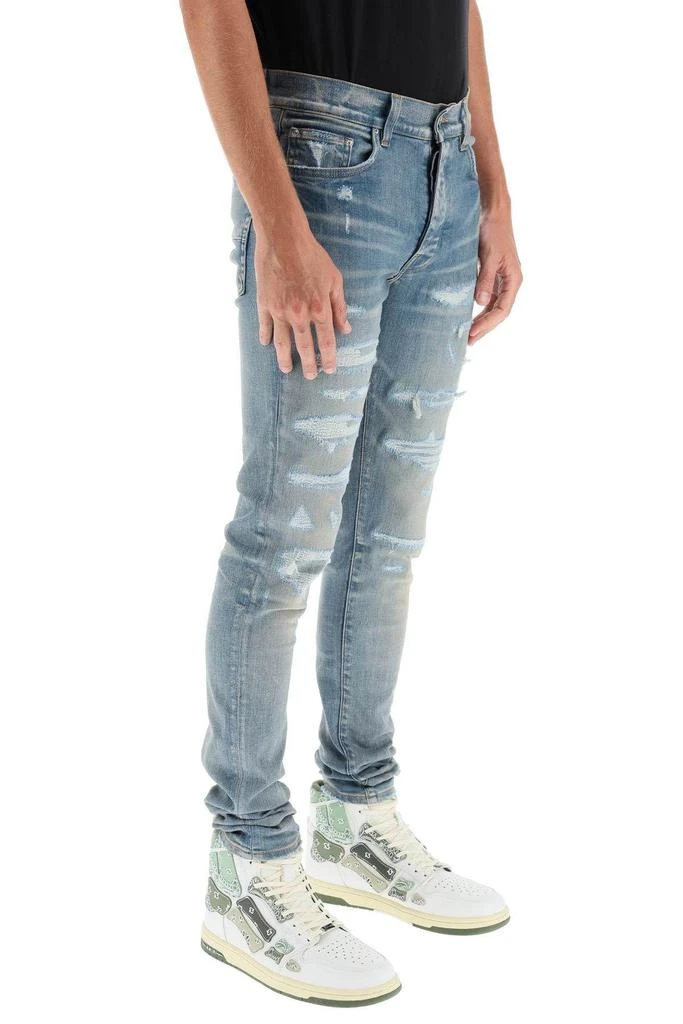 商品AMIRI|DISTRESSED SKINNY JEANS,价格¥7894,第3张图片详细描述