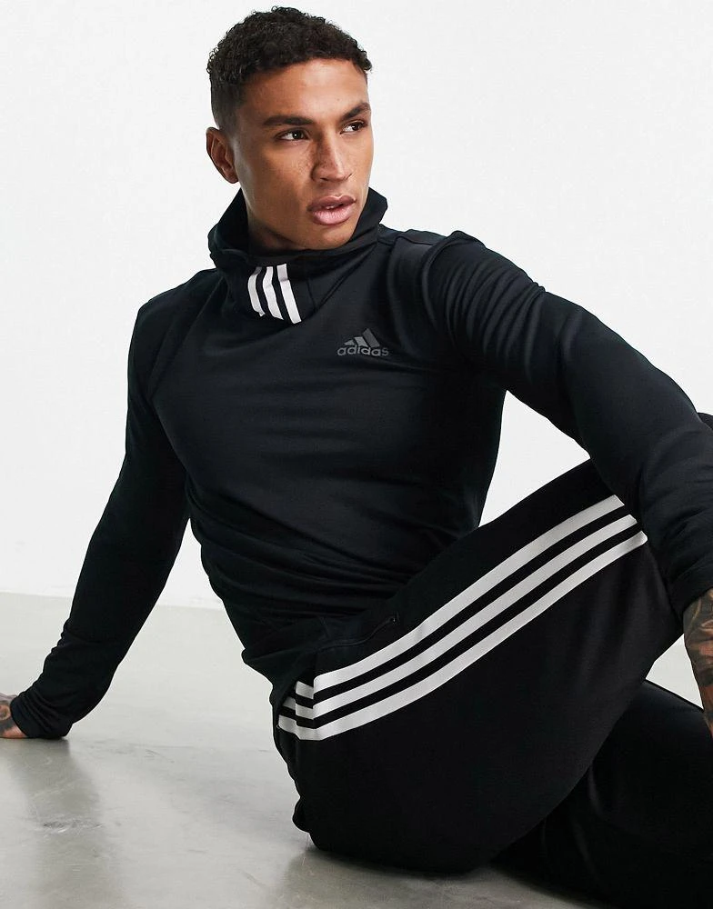 商品Adidas|adidas Training Cold Rdy long sleeve top with face covering three stripes in black,价格¥281,第1张图片