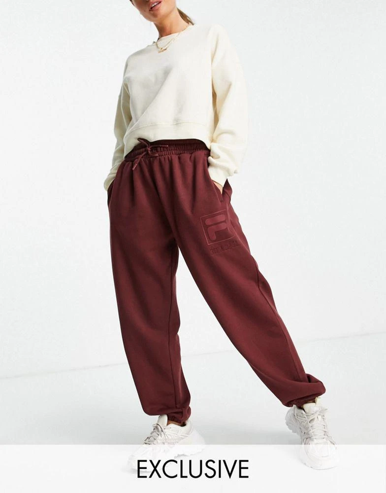 商品Fila|Fila oversized joggers with tonal branding in red,价格¥411,第1张图片