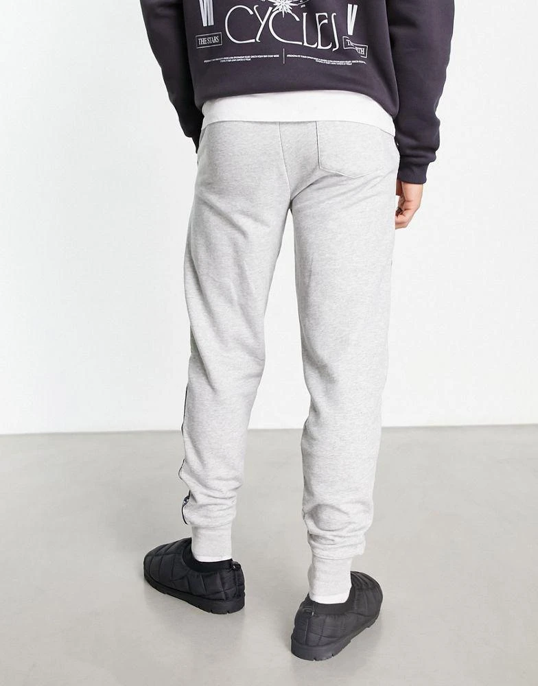 商品Tommy Hilfiger|Tommy Hilfiger authentic cuffed lounge joggers side logo taping in grey marl,价格¥675,第2张图片详细描述