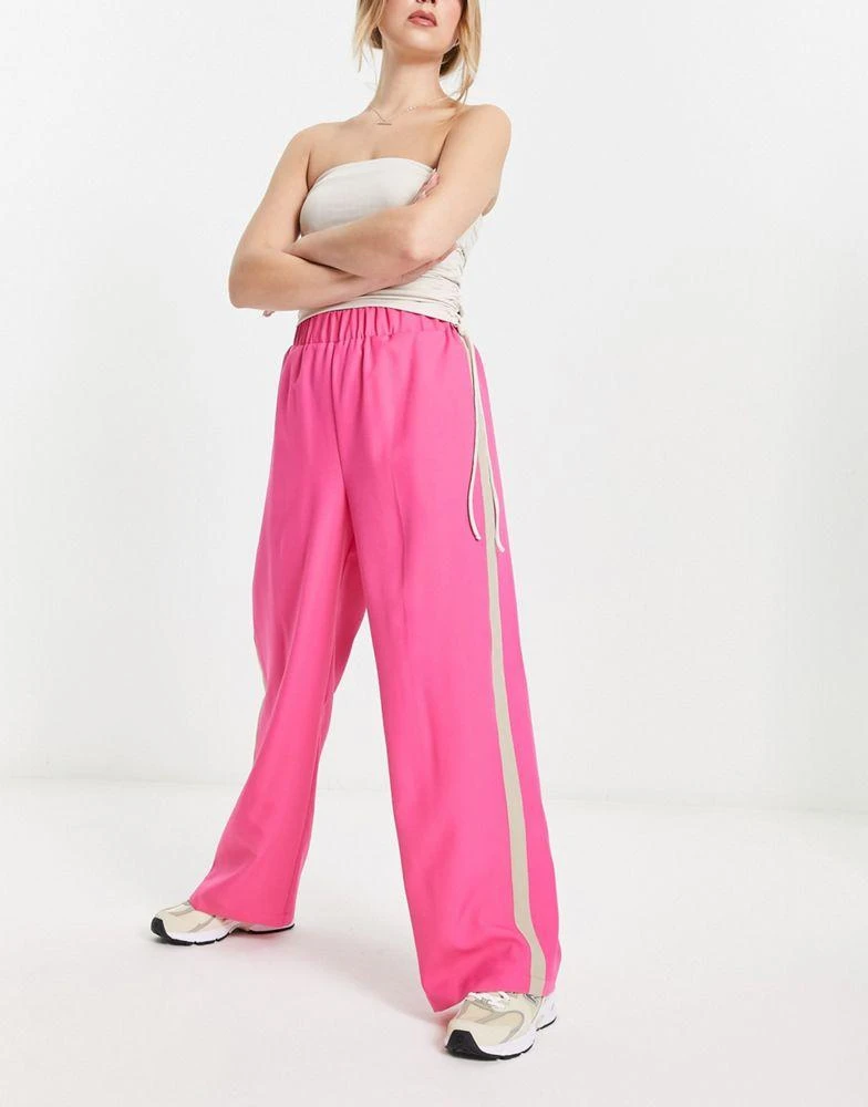 商品ASOS|ASOS DESIGN elastic waist side stripe trouser in pink with stone stripe,价格¥137,第1张图片