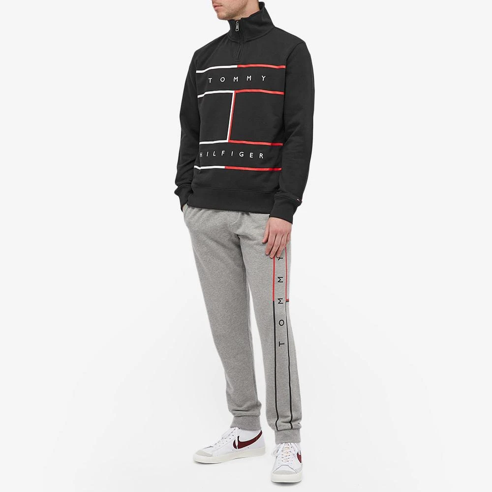 Tommy Jeans Larger RWB Flag Half Zip Sweat 商品