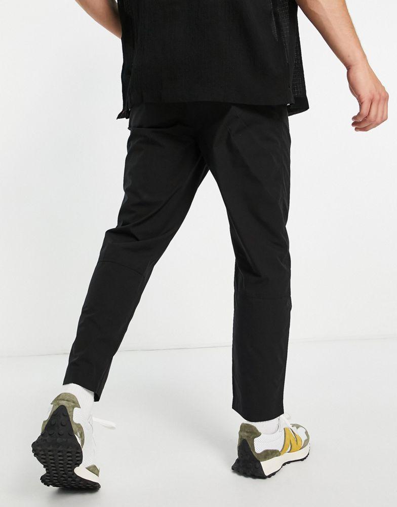 商品Calvin Klein|Calvin Klein Jeans utility tab belt loose woven trousers in black,价格¥565,第4张图片详细描述