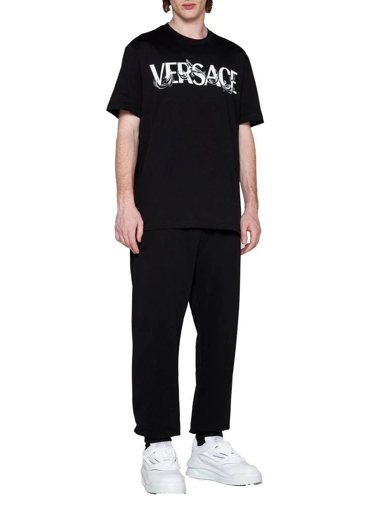 商品Versace|Versace Logo Printed Tapered Track Trousers,价格¥2856-¥3194,第4张图片详细描述