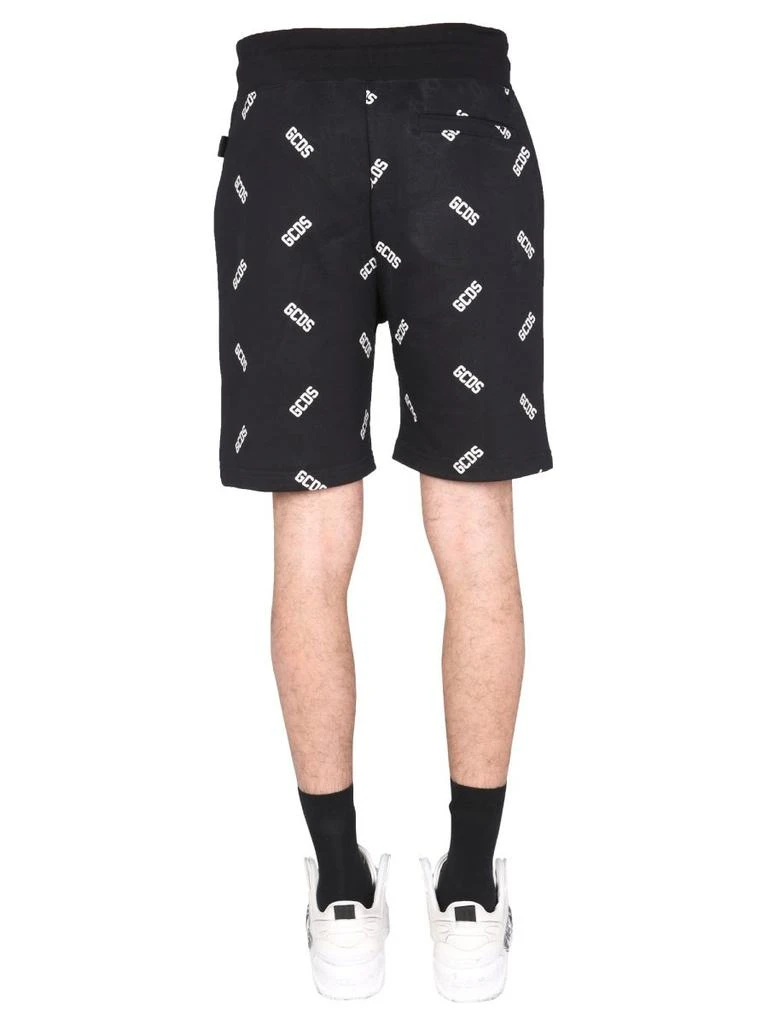 商品GCDS|GCDS All-Over Logo Printed Bermuda Shorts,价格¥991,第2张图片详细描述