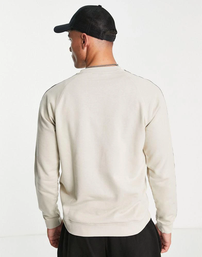 商品Calvin Klein|Calvin Klein Performance chest logo sweatshirt in beige,价格¥755,第3张图片详细描述
