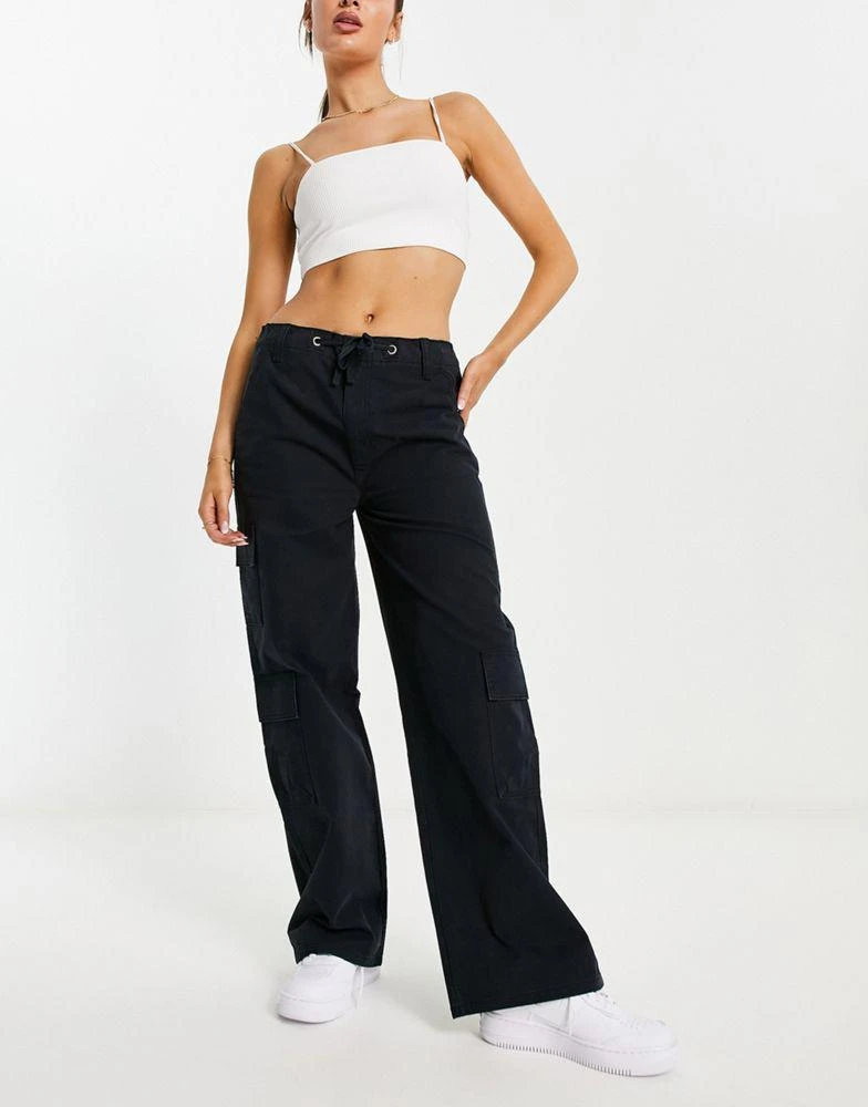 商品ASOS|ASOS DESIGN oversized cargo trouser with multi pocket and tie waist in black,价格¥181,第1张图片