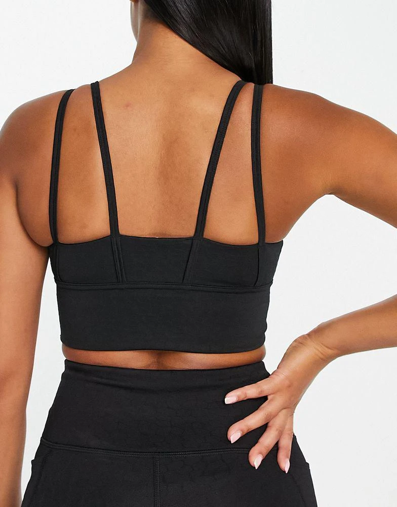 商品Puma|Puma Training Flawless mid support sports bra in black,价格¥192,第3张图片详细描述