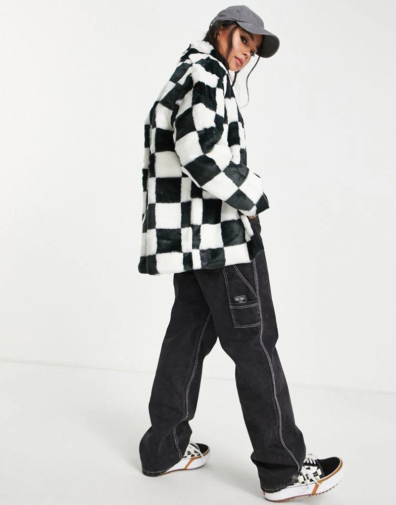 商品Vans|Vans Natalie funnel neck puffer jacket in black/white checkerboard,价格¥814,第2张图片详细描述