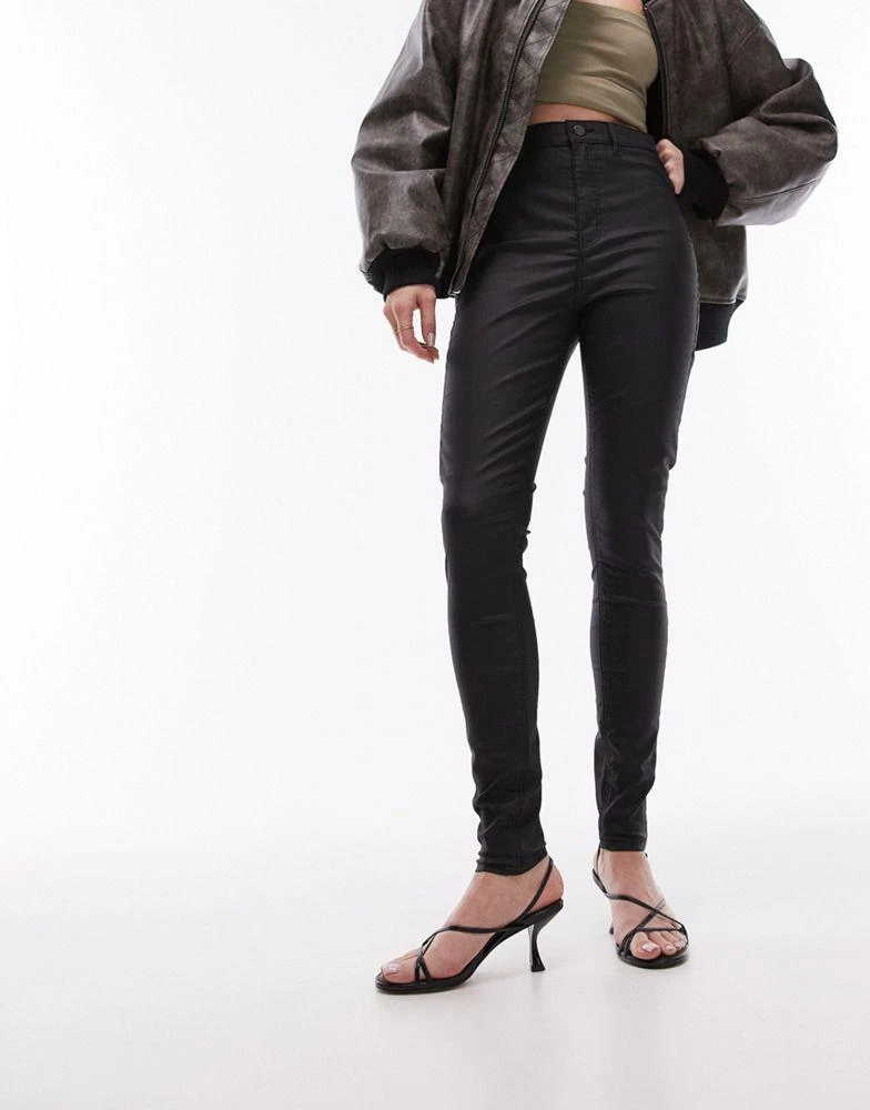 商品Topshop|Topshop high rise Joni jeans in coated black,价格¥271,第1张图片